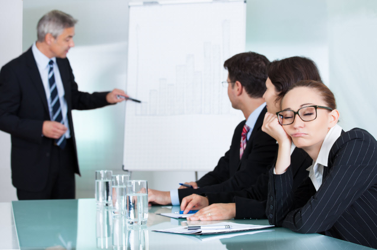 Woman sleeping at meeting.