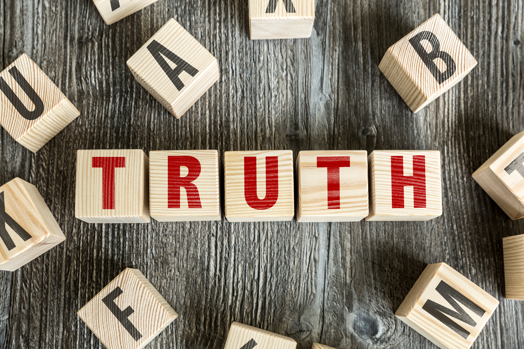 Wooden blocks spelling out the word truth