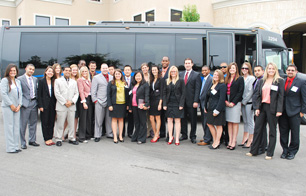 Large group of team members posing together